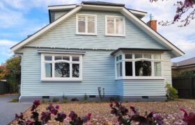 Rebuilt heritage-style chimney using salvaged decorative bricks in Christchurch bungalow earthquake repair