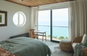 Main bedroom at Scarborough House with panoramic views across Scarborough and the sea